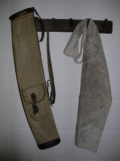 Small canvas and leather golf bag and workshop apron