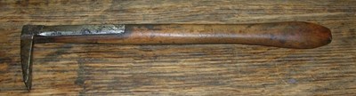 Nail remover with steel head and wooden shaft