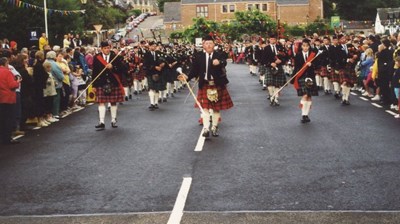 Massed Pipe Bands in Dornoch July 2000