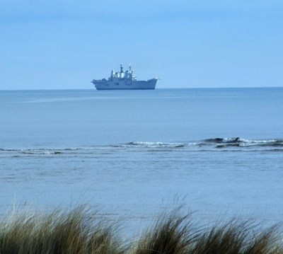 HMS Ark Royal viewed from mouth of Loch Fleet