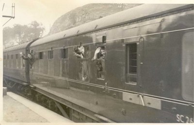 Mainline train departing from The Mound station