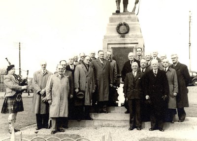 Ex Serviceman grouped at the Dornoch War Memorial